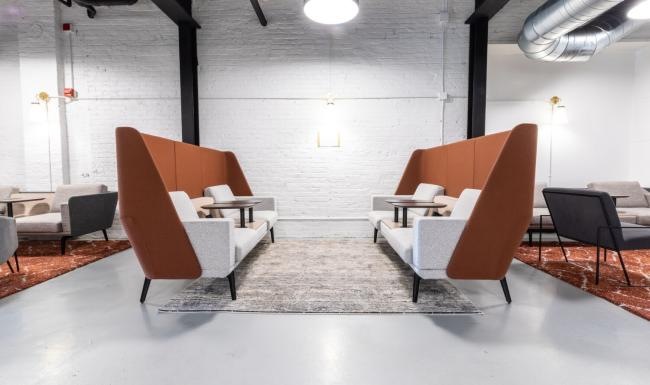 a room with chairs and tables