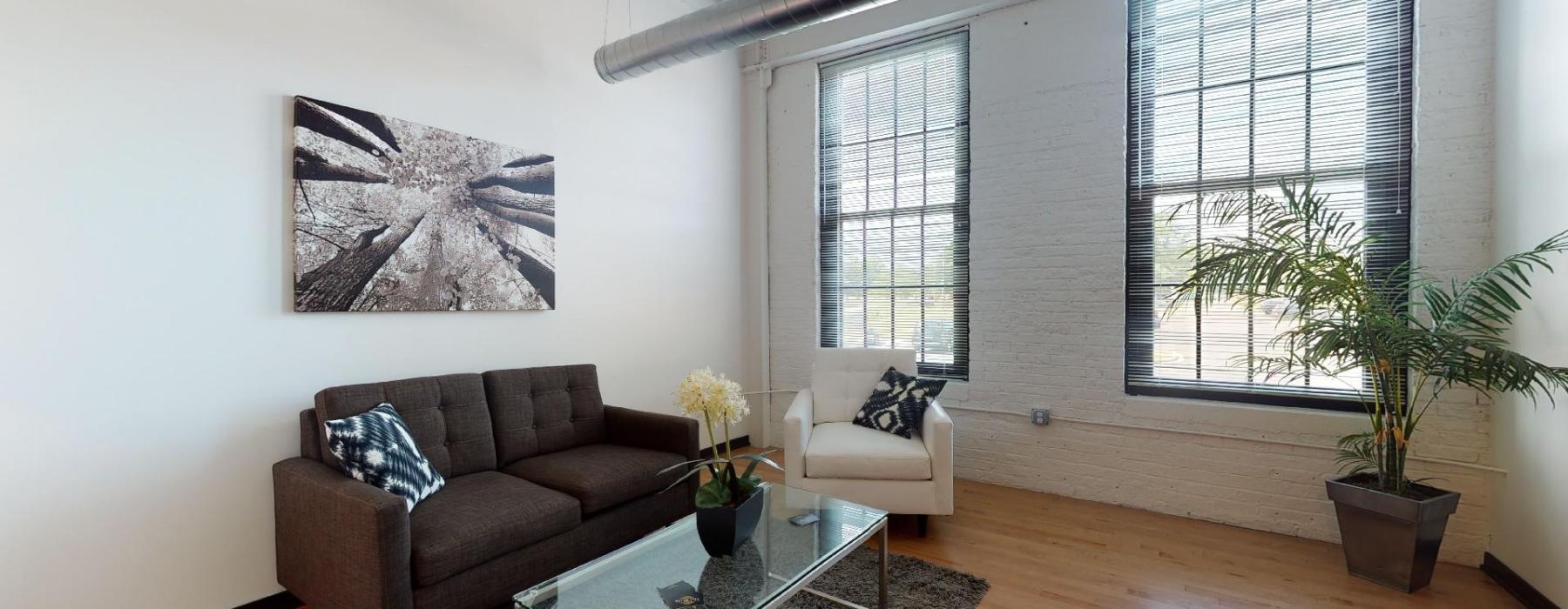 a living room with a couch and a coffee table