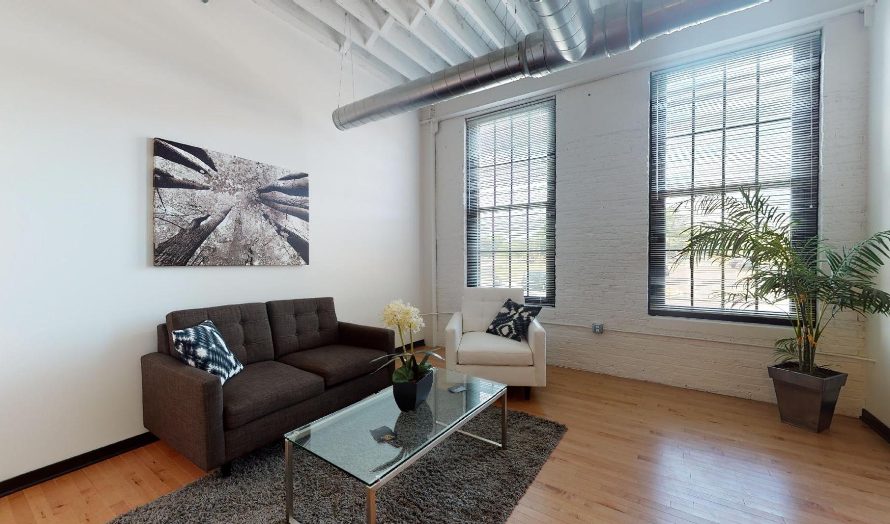 a living room with a couch and a coffee table